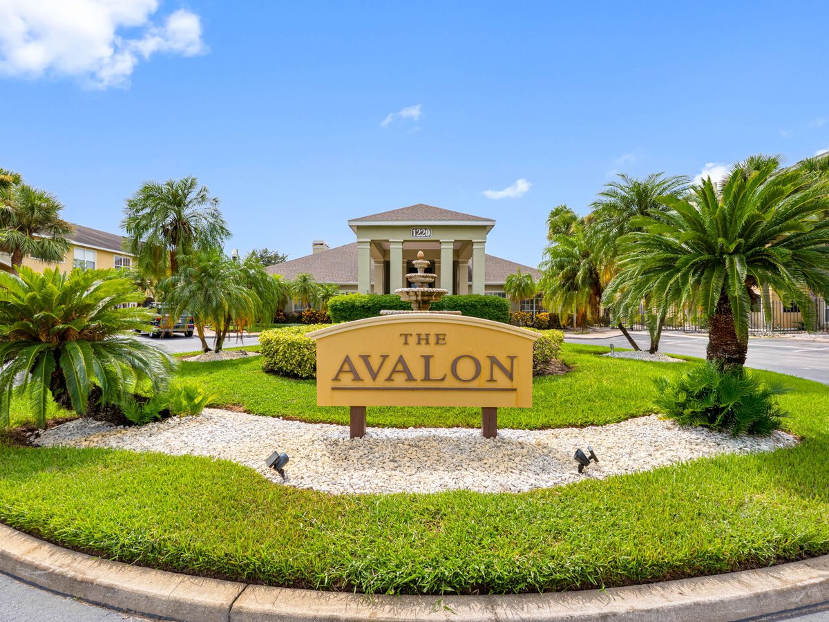 The Avalon entrance sign and landscaped roundabout at 1220 S Missouri Ave